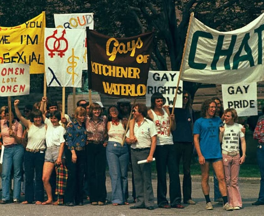 #DYK Pride Week 1973 - image of several people holding up signs advocating for gay rights in Kitchener Waterloo.